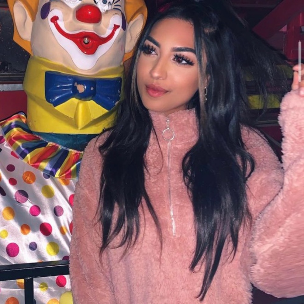 Cropped pink fuzzy sweater